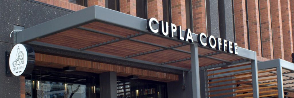 Front entrance of Cupla Coffee in Salt Lake City—a local favorite for ethically sourced brews and cozy café vibes