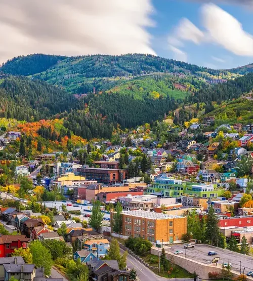 Park City coffee culture: A scenic view of Park City, Utah, with colorful buildings nestled in the Wasatch Mountains.