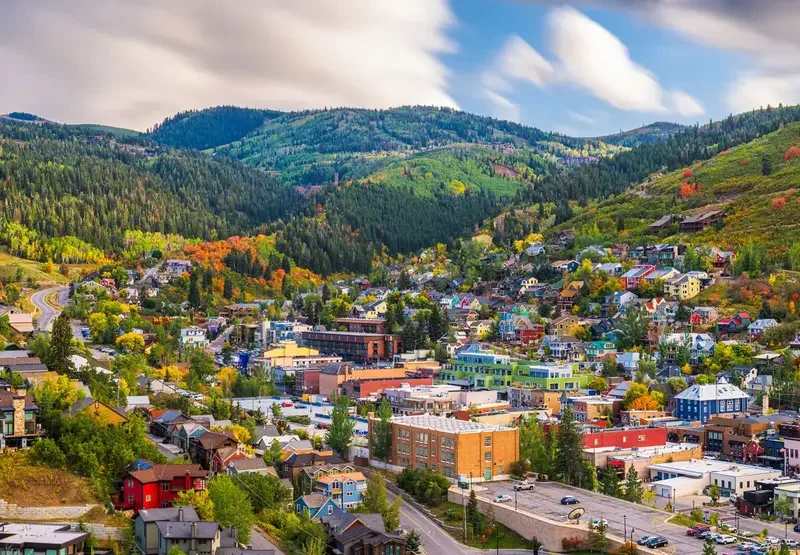 Park City coffee culture: A scenic view of Park City, Utah, with colorful buildings nestled in the Wasatch Mountains.